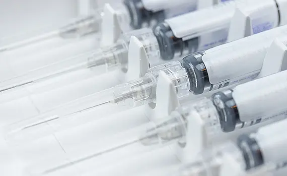 New vaccine syringes in box 