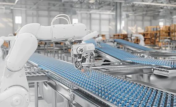 A manufacturing plant with robotic arms used in the production of medicines